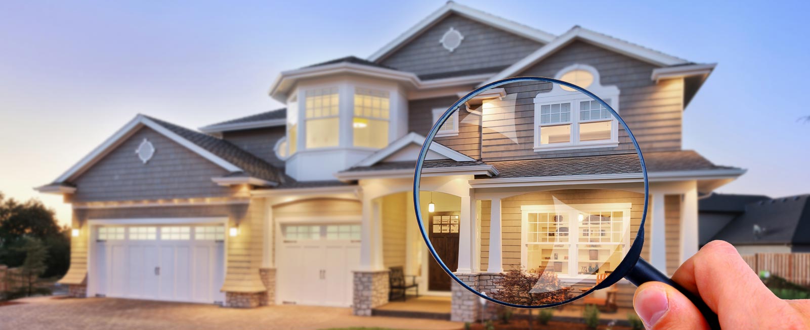 House exterior viewed through a magnifying glass