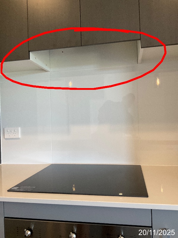 Empty rangehood position above a cooktop marked with a red inspection circle